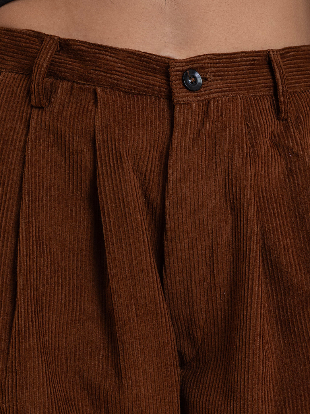 Back view of brown corduroy baggy trousers