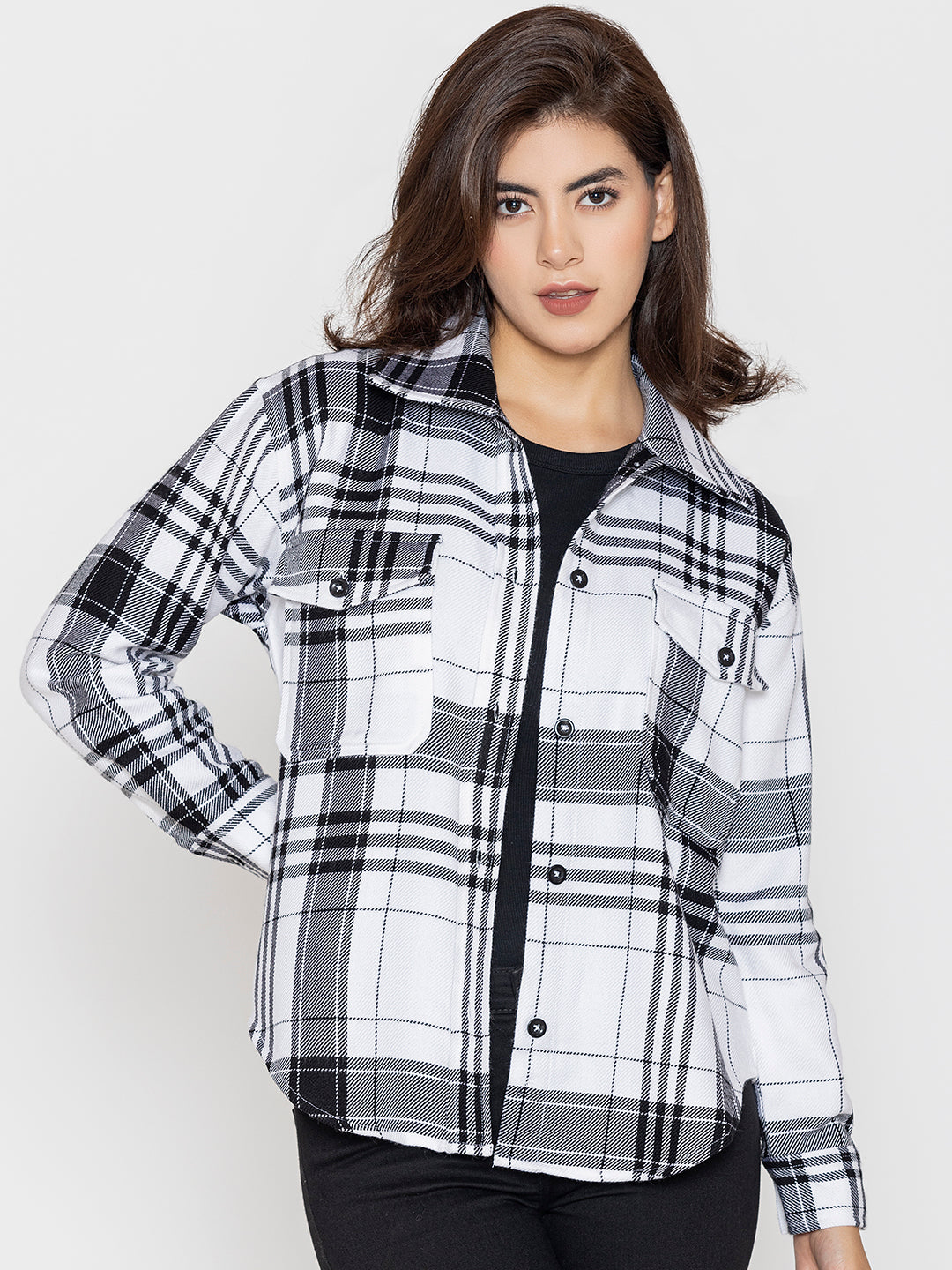 White and black tartan shacket close-up of acrylic fabric