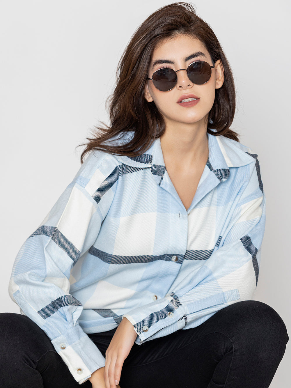 Sky blue tartan plaid shirt with spread collar and buttoned cuffs