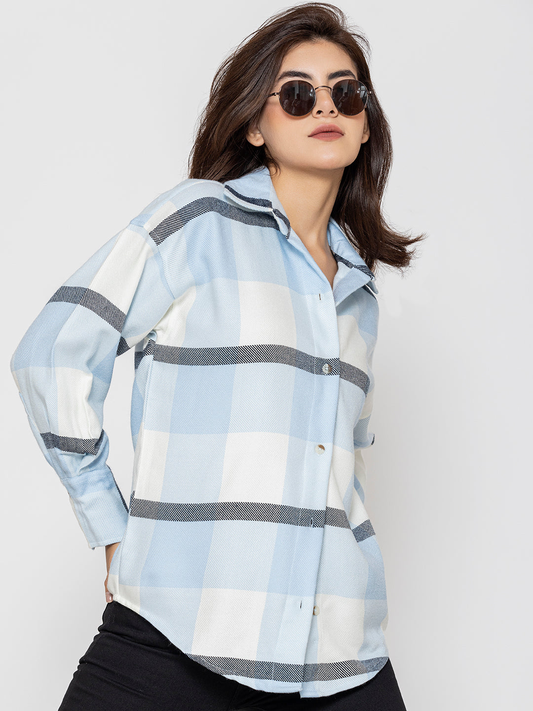 Side view of sky blue oversized tartan check shirt