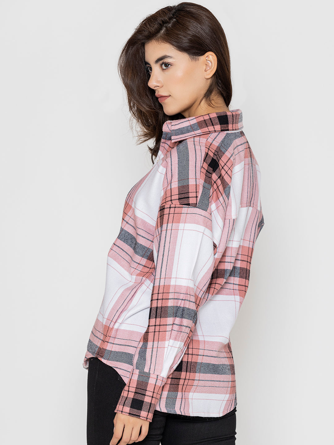 Light pink tartan plaid shirt close-up of acrylic weave fabric