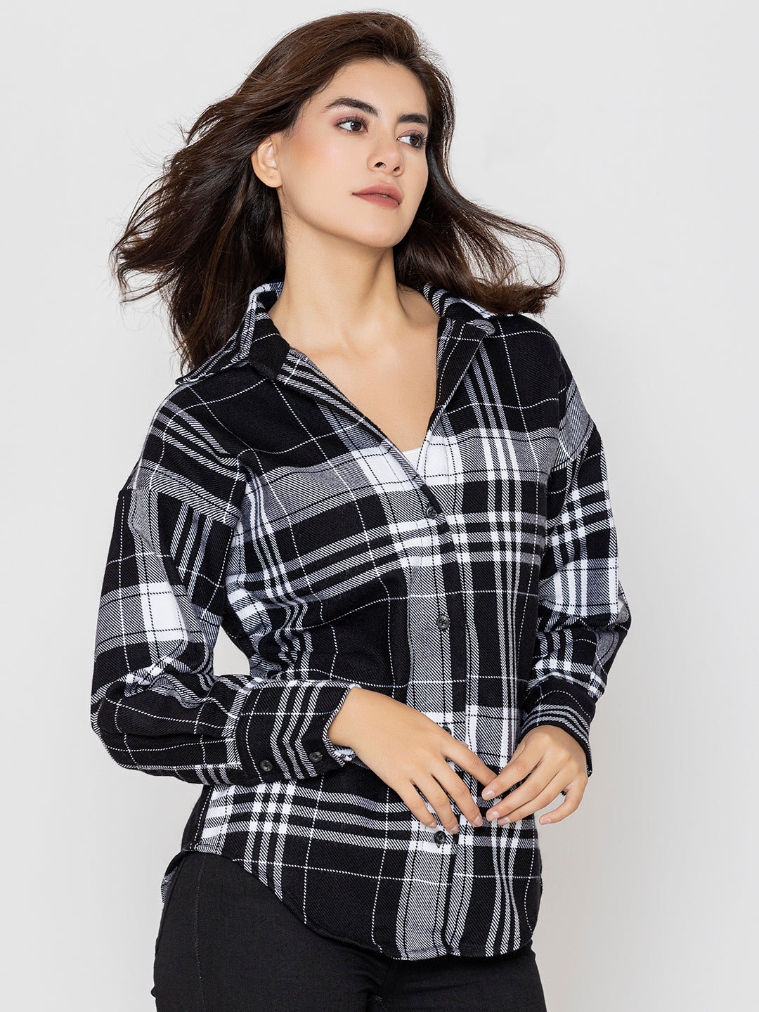 Side view of black and white oversized tartan shirt