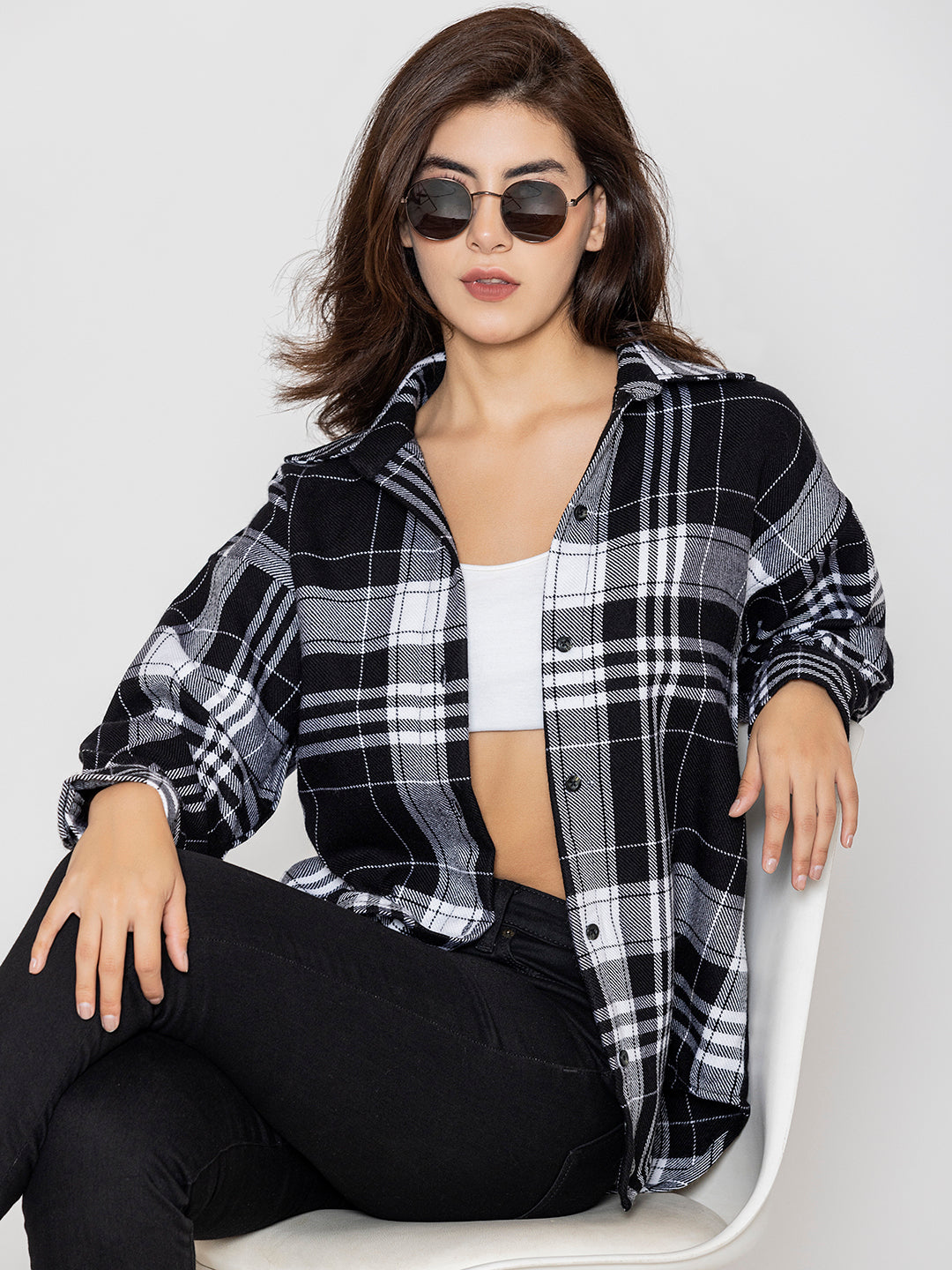 Back view of black and white oversized tartan shirt