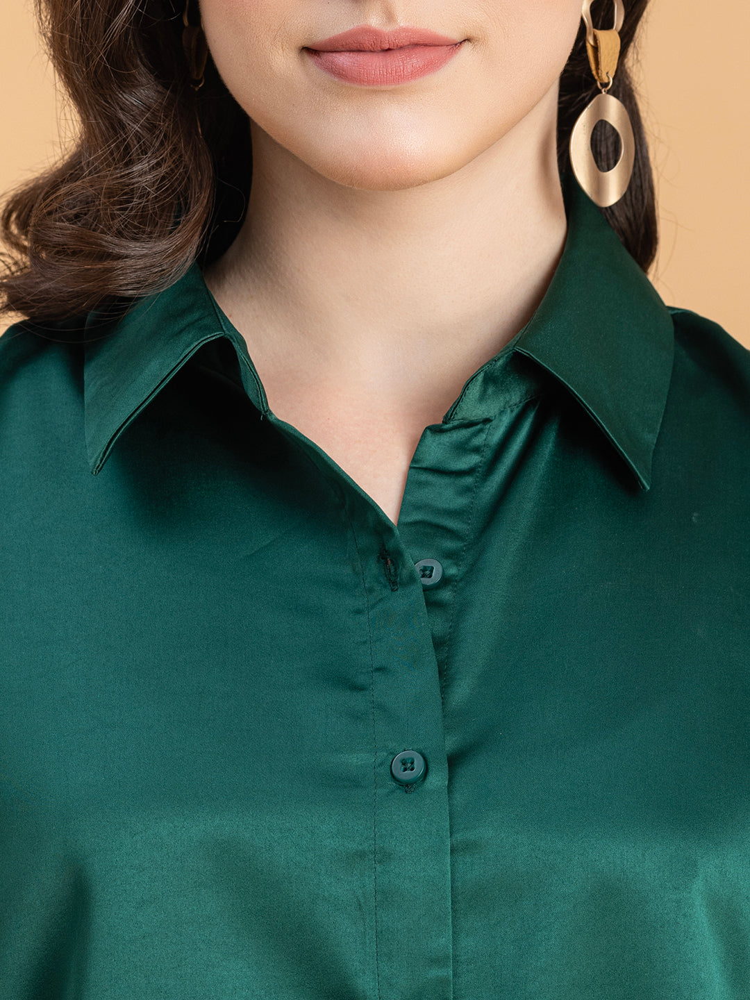 Detail of dark green satin fabric drape