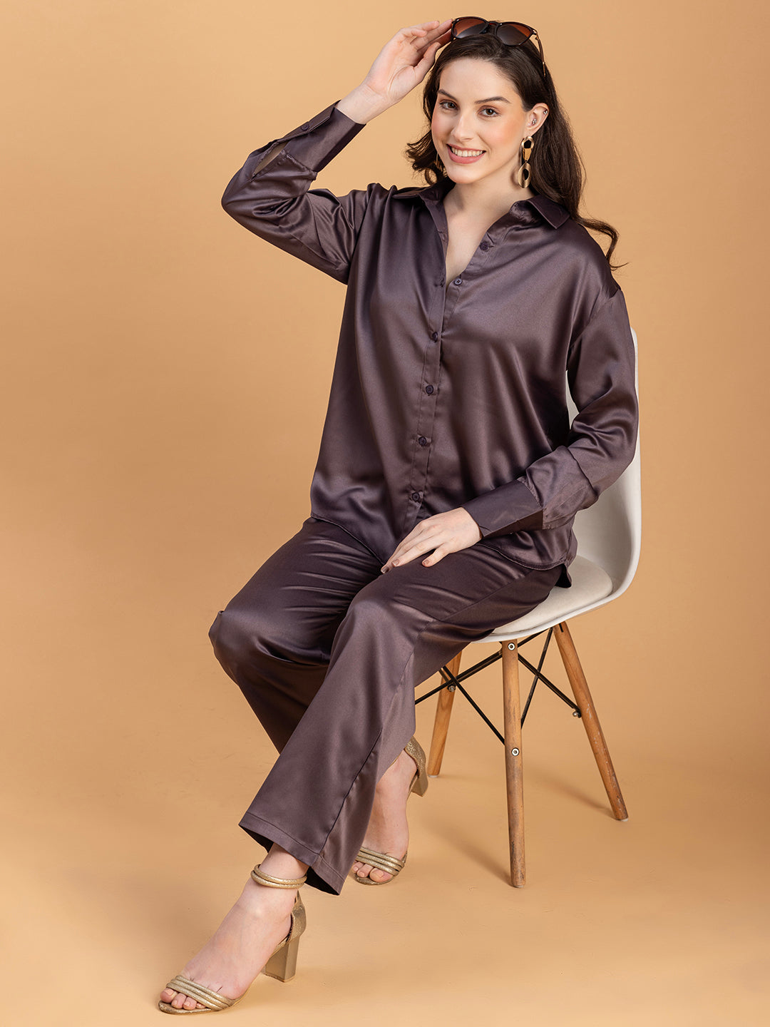 Lifestyle shot of woman in grey satin co-ord
