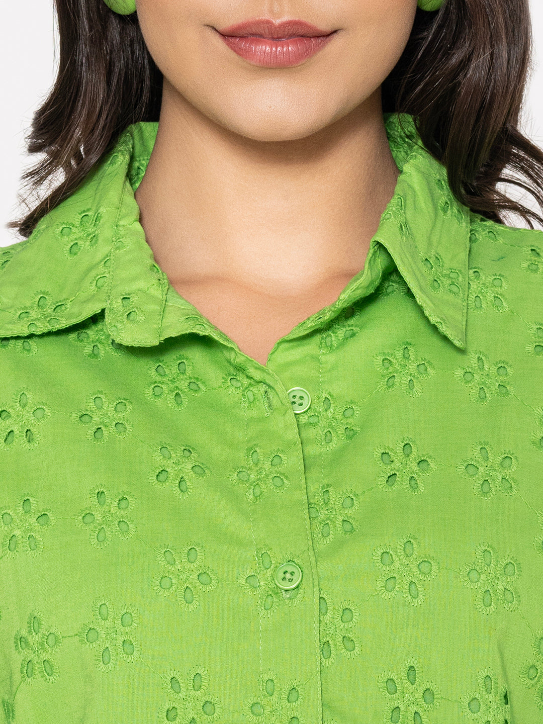 Cuff and embroidery detail on lime green cotton shirt
