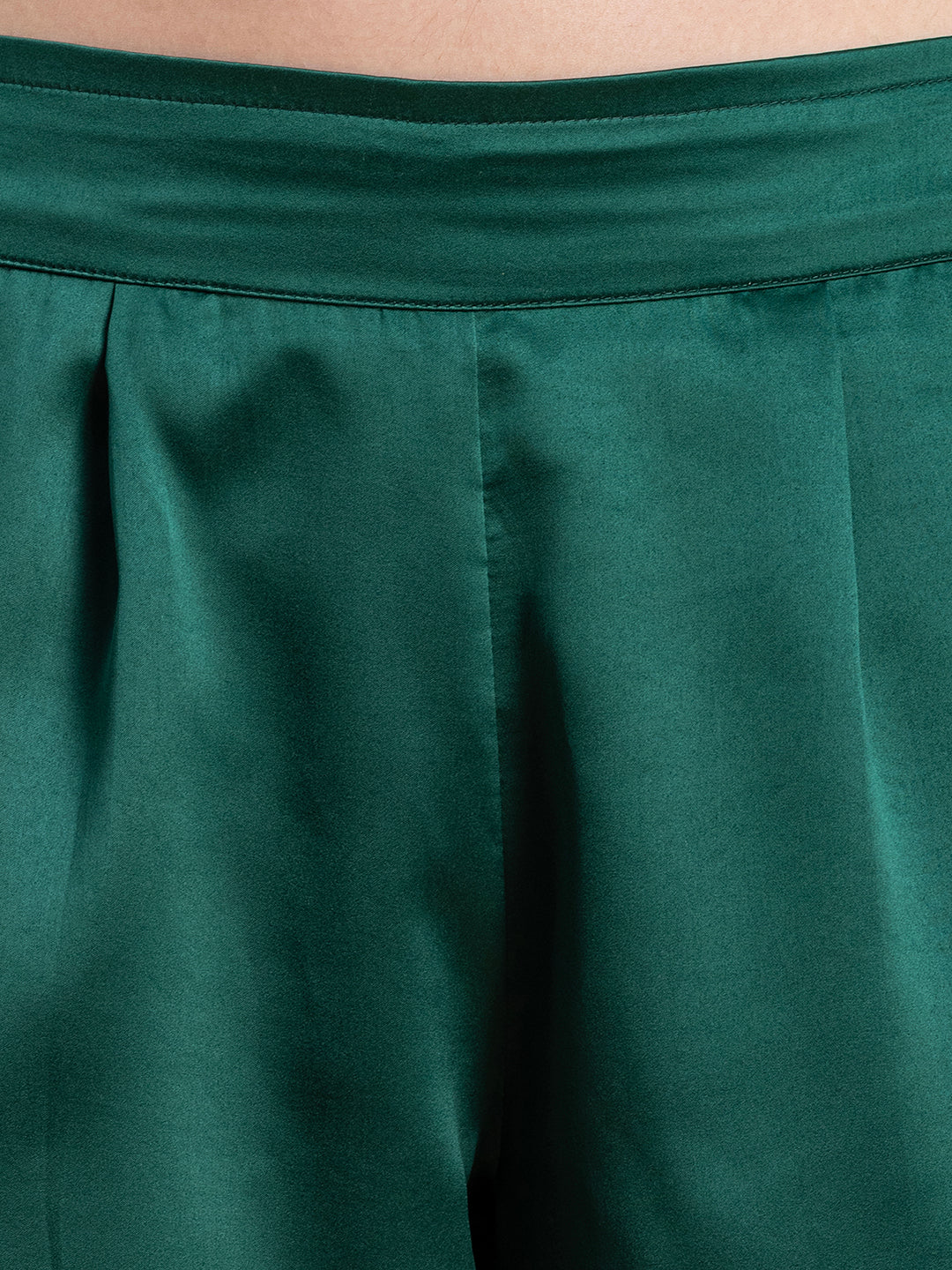 Full outfit view of dark green satin co-ord set