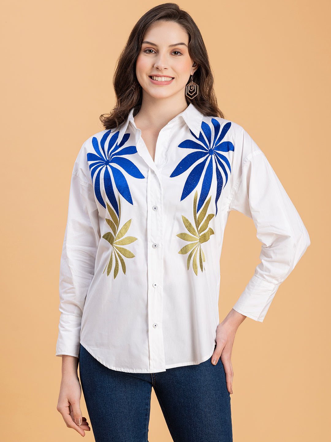 Front view of white embroidered cotton oversized shirt