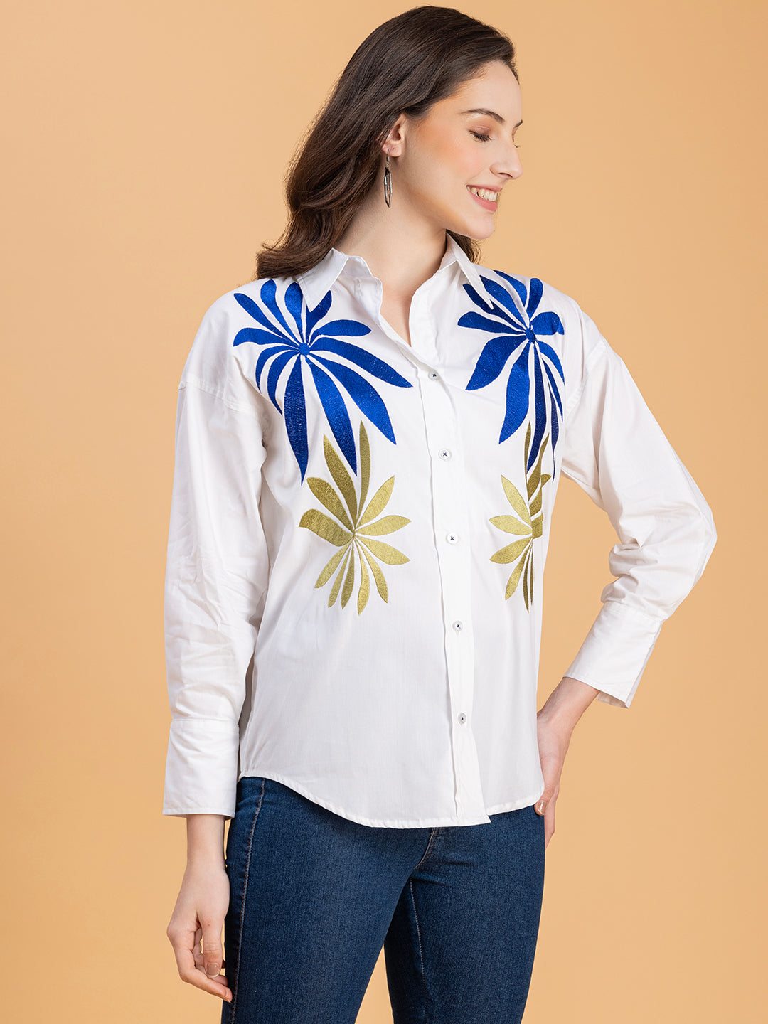Back view of white embroidered cotton oversized shirt