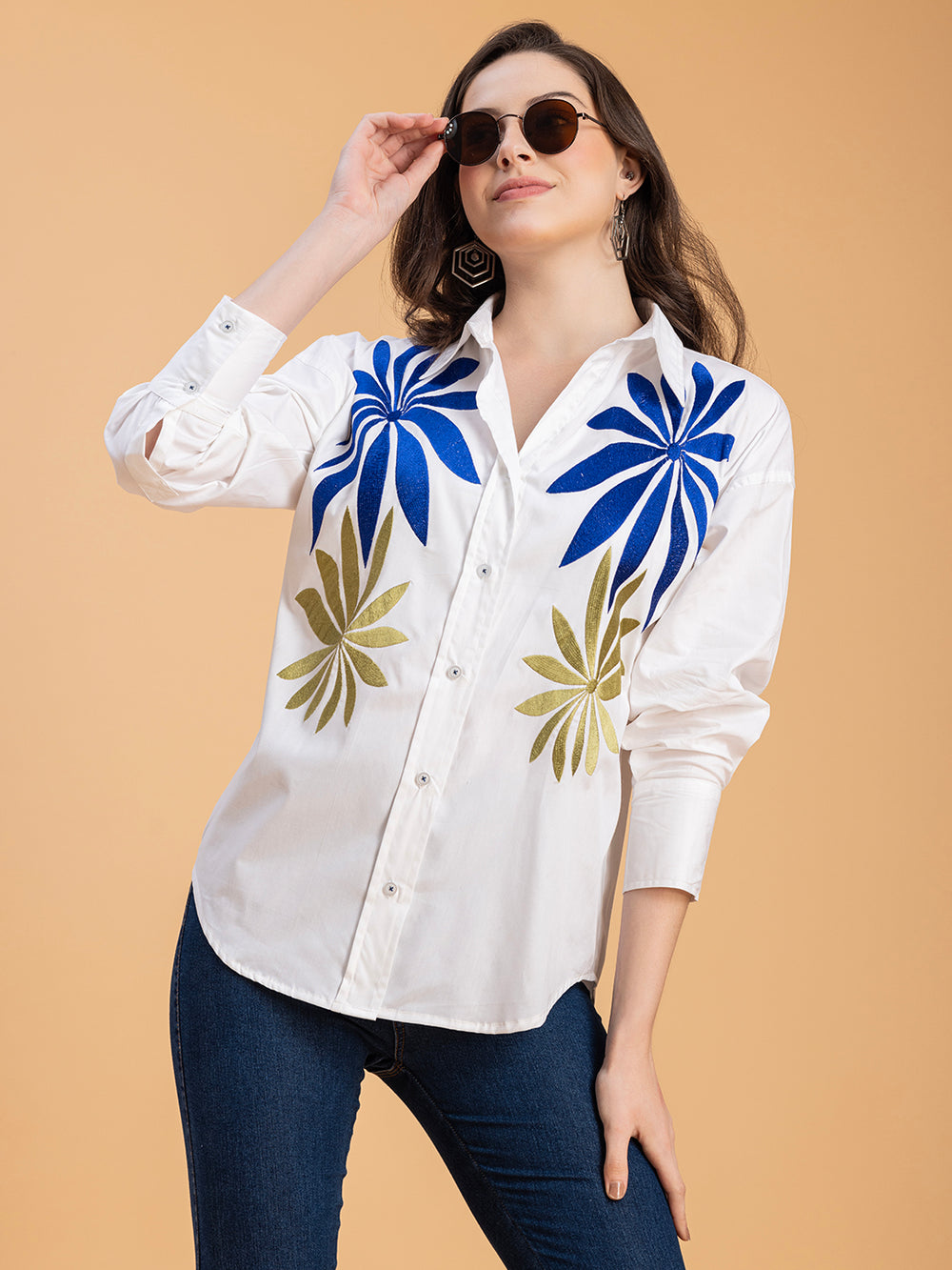 Side view of white embroidered cotton oversized shirt