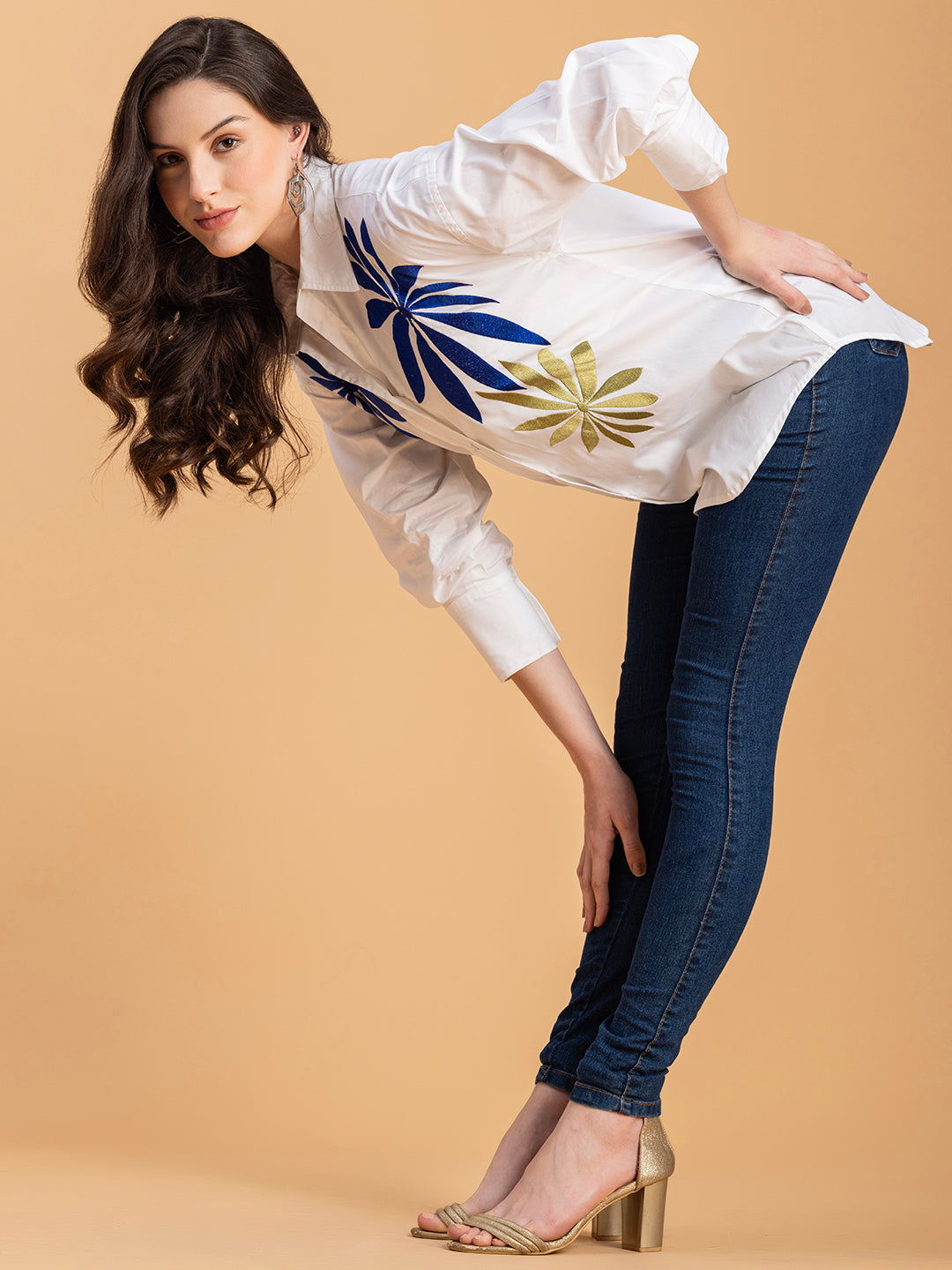 Styled outfit of white embroidered cotton shirt