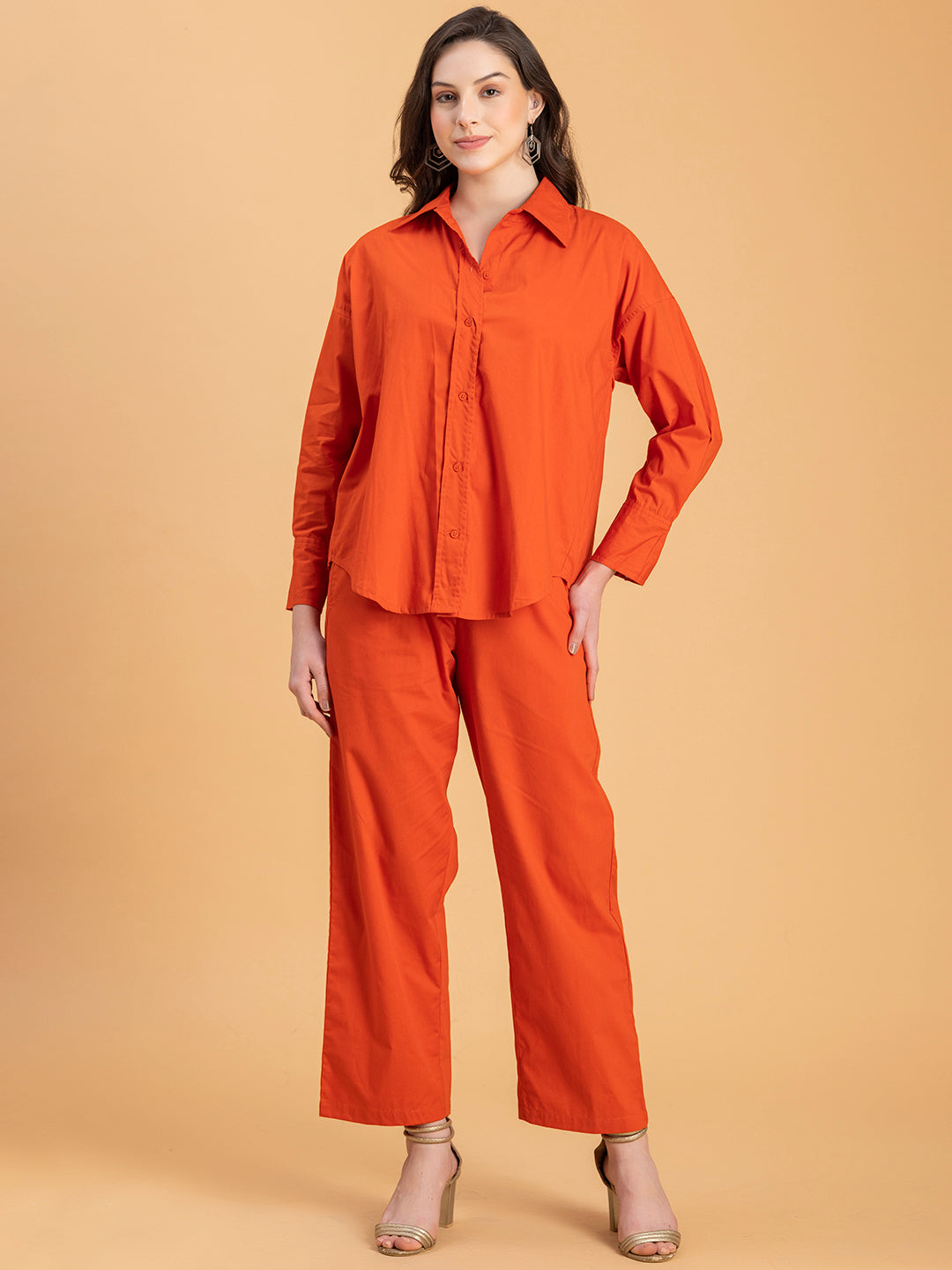 Lifestyle shot of woman in rust poplin co-ord set