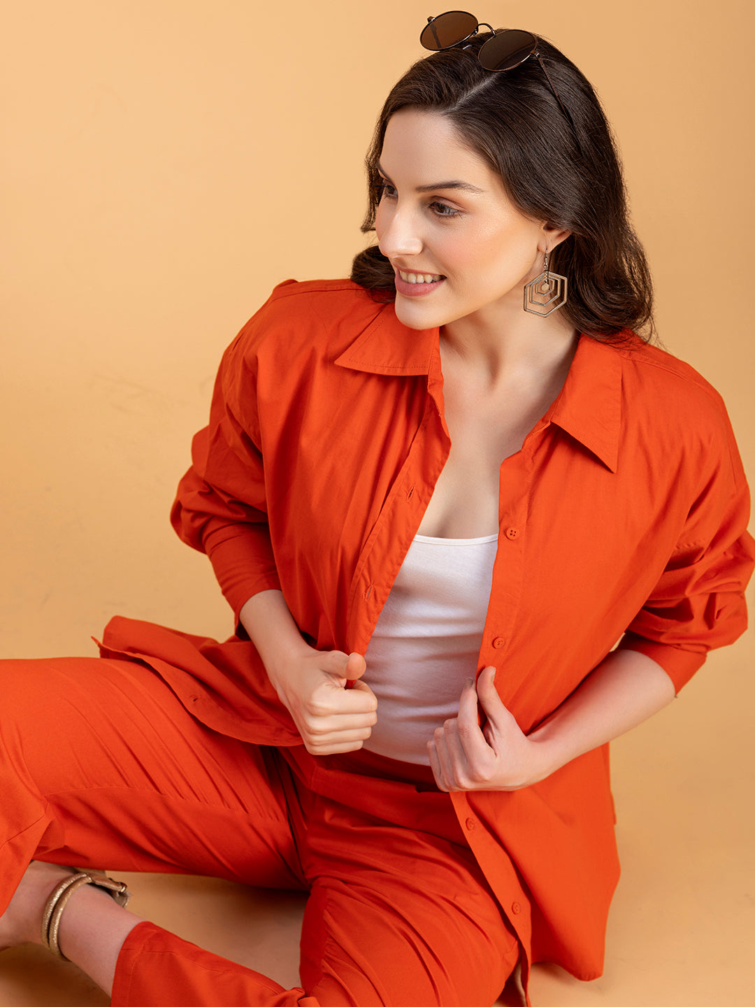 Front view of rust poplin co-ord set spread collar shirt