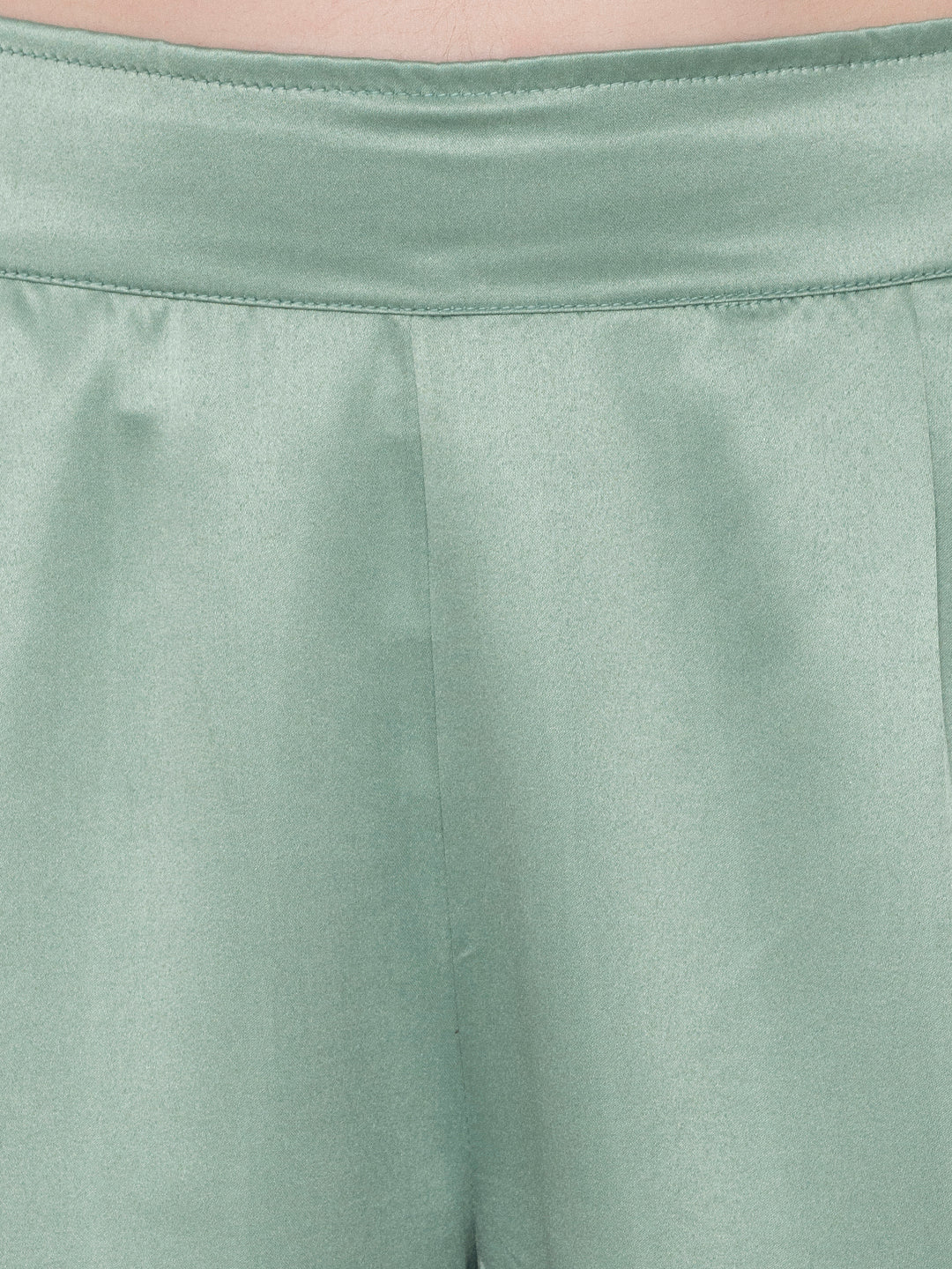 Close-up of light green satin shirt collar