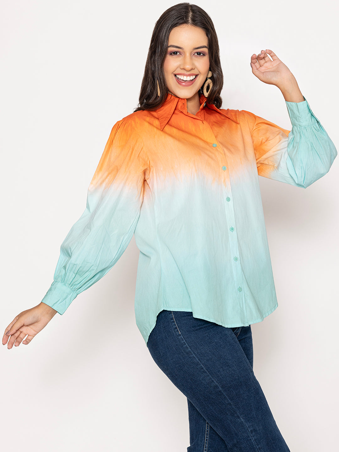 Close-up of buttoned cuffs and ombre dye