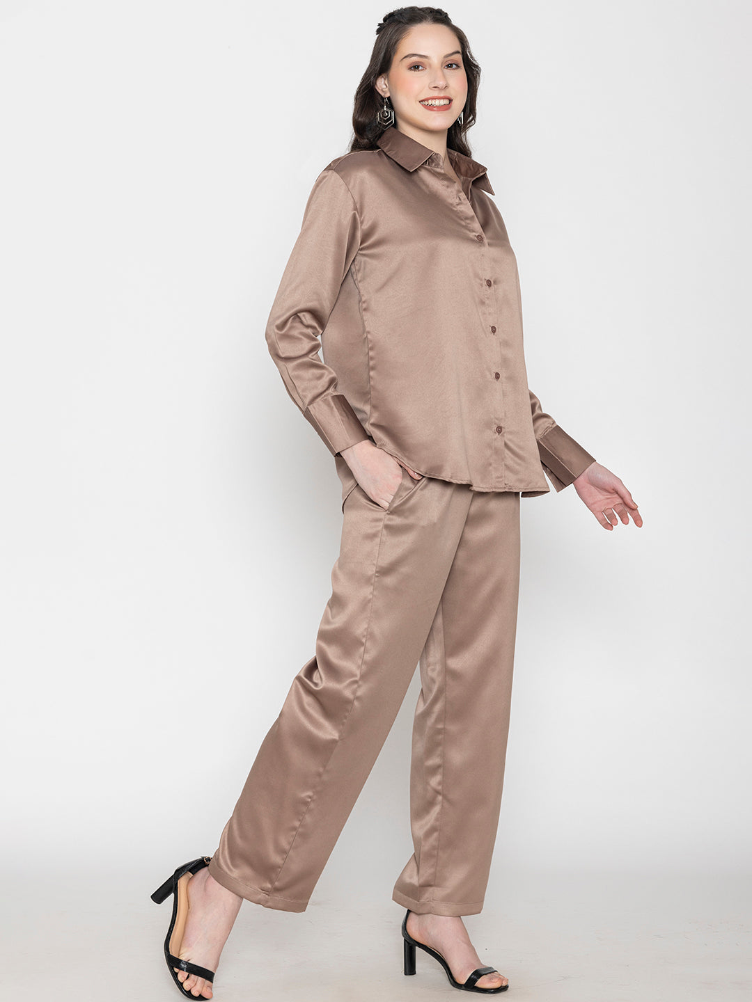 Lifestyle shot of woman in beige satin co-ord