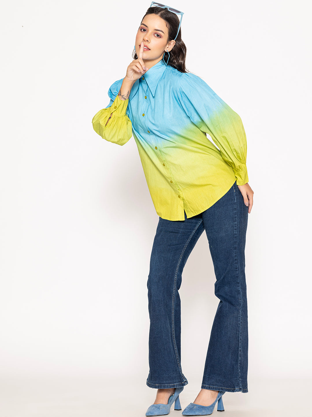 Detail of side slits and curved hemline