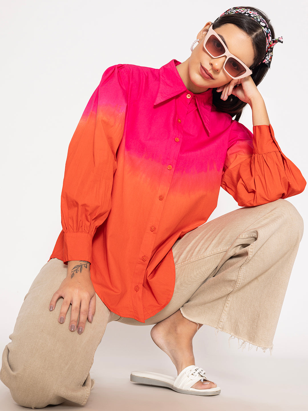 Close-up of buttoned cuffs and ombre dye detail