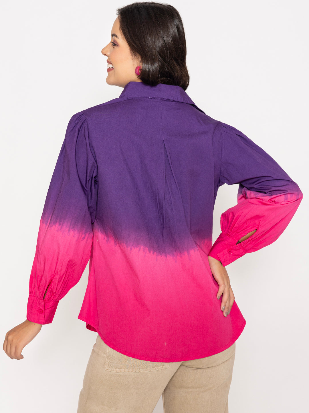 Close-up of buttoned cuffs and ombre dye detail