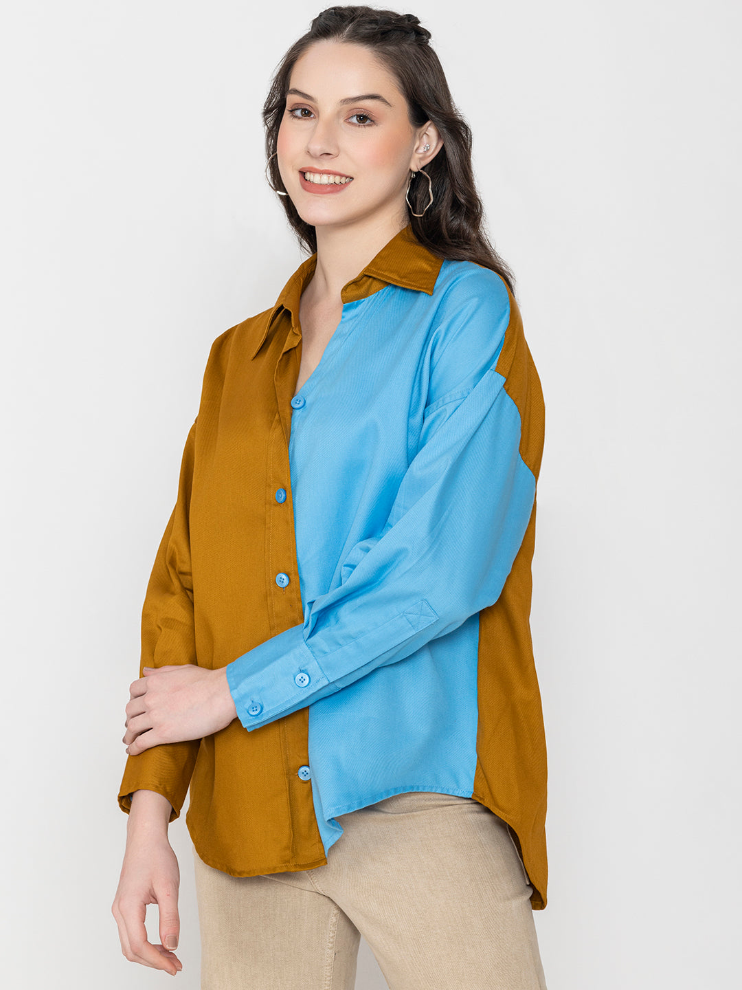 Lifestyle shot of brown sky blue colorblocked shirt