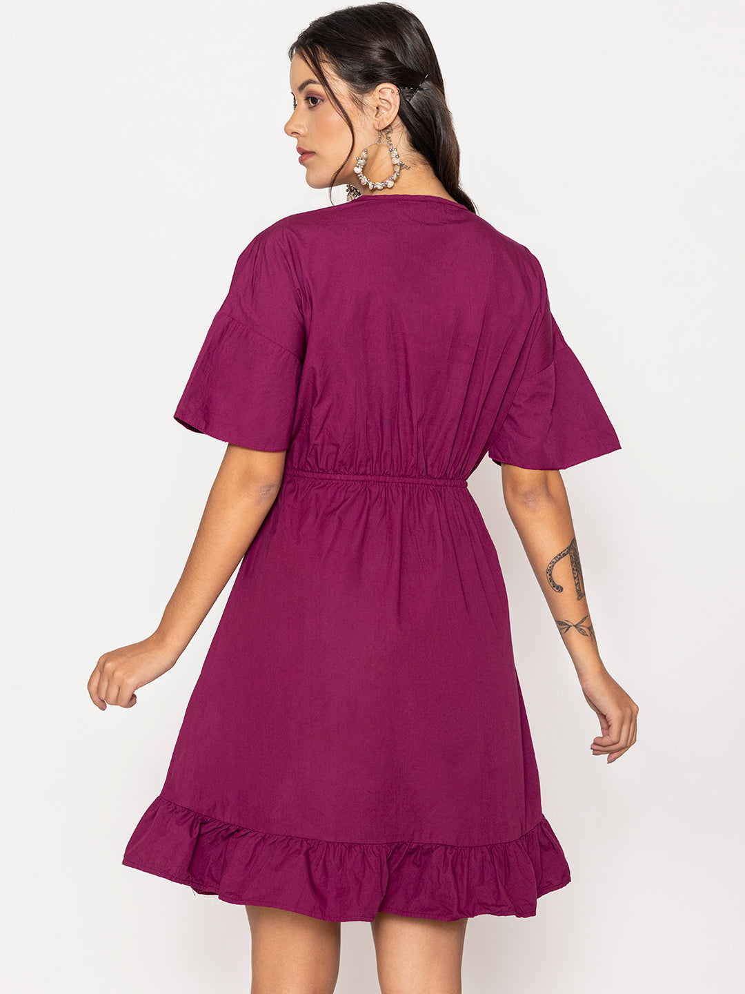 Hem detail of wine cotton dress