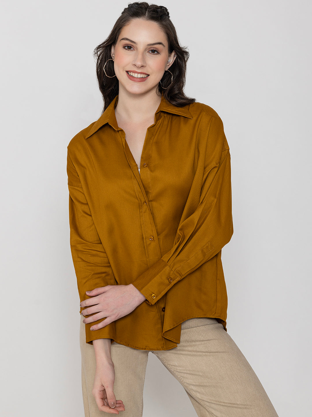 Lifestyle shot of brown twill cotton oversized shirt