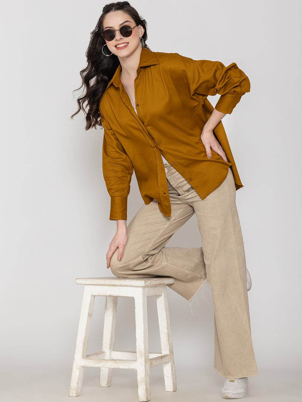 Side view of brown twill cotton shirt on model