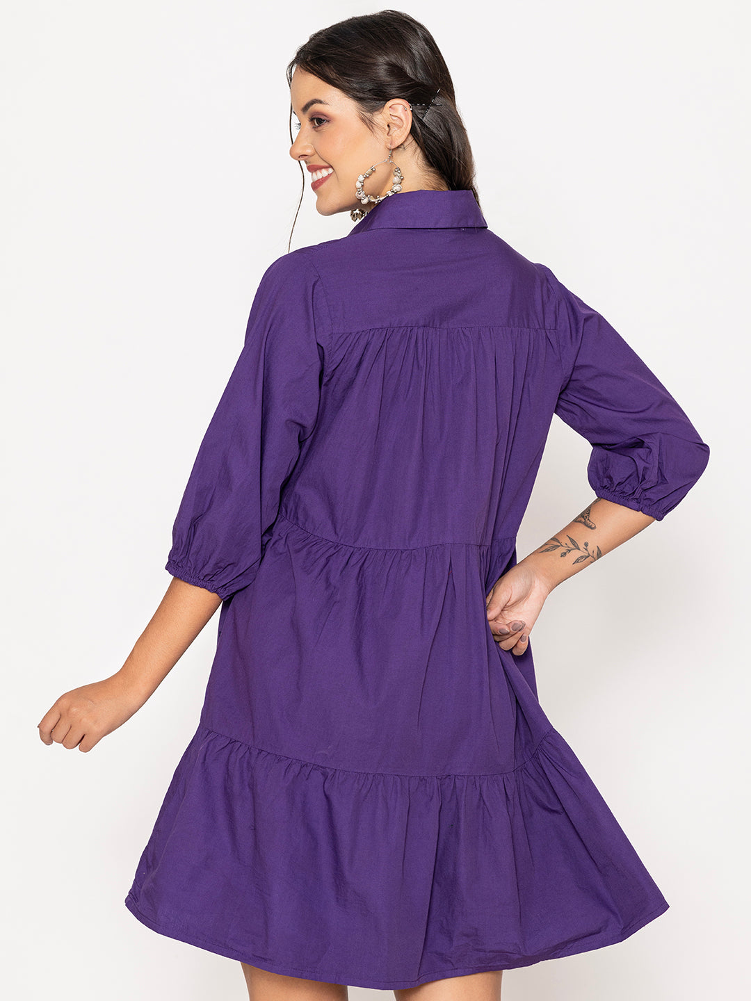 Hem detail of purple cotton shirt dress