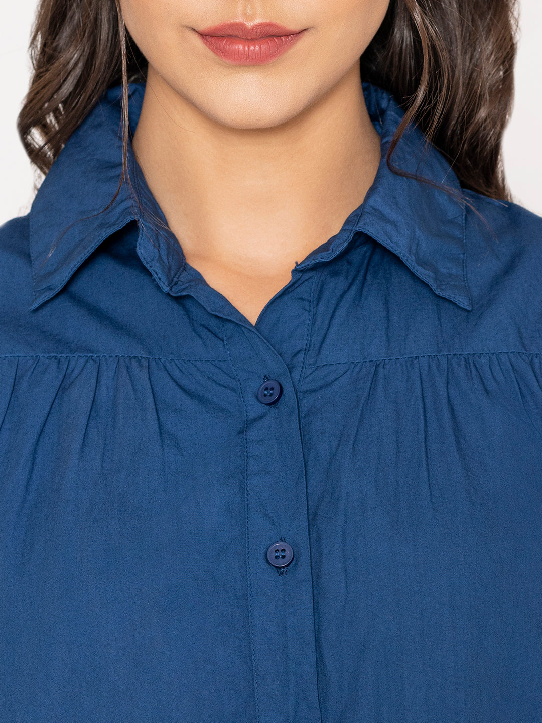 Detail of cotton fabric on blue shirt dress