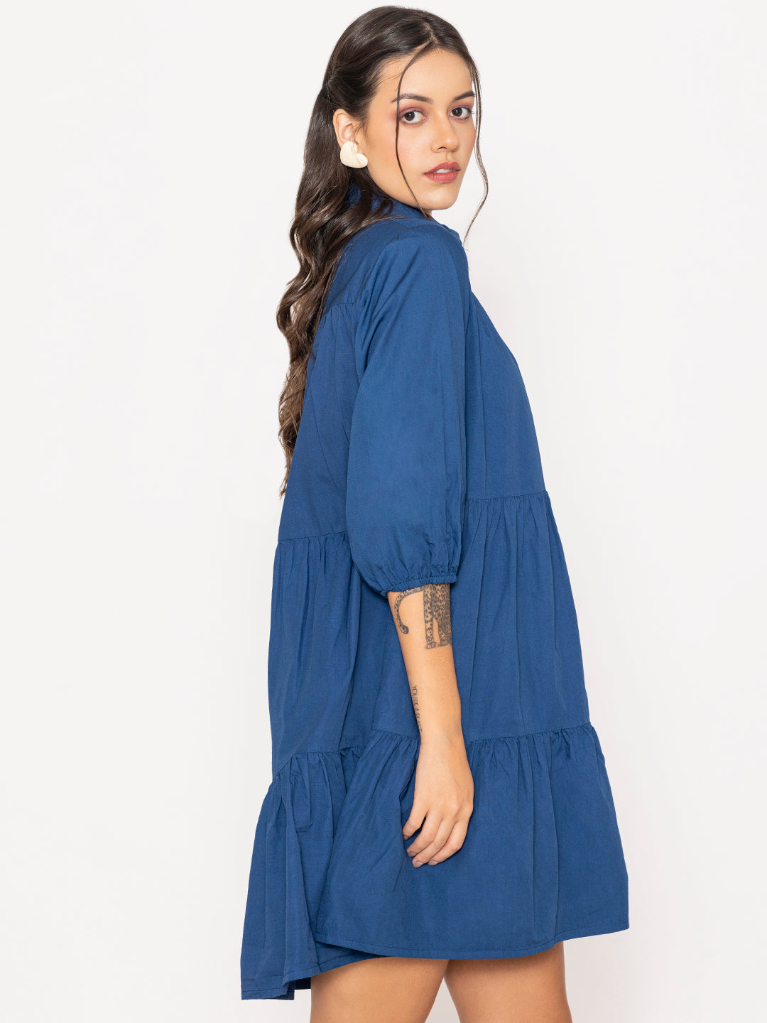 Hem detail of blue cotton shirt dress