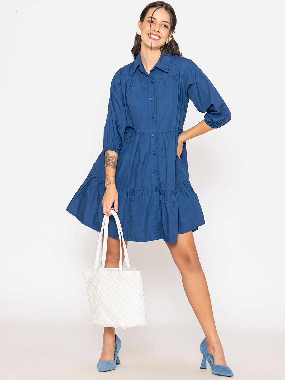 Close-up of collar on blue cotton shirt dress
