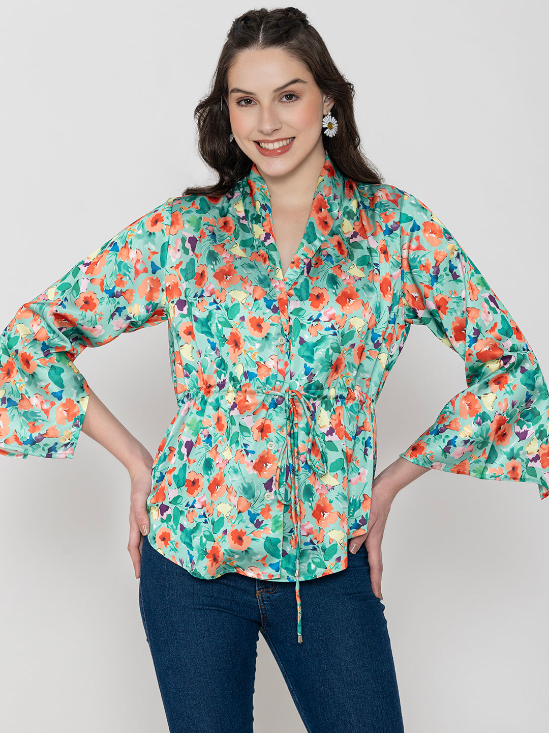 Back view of green floral print satin top