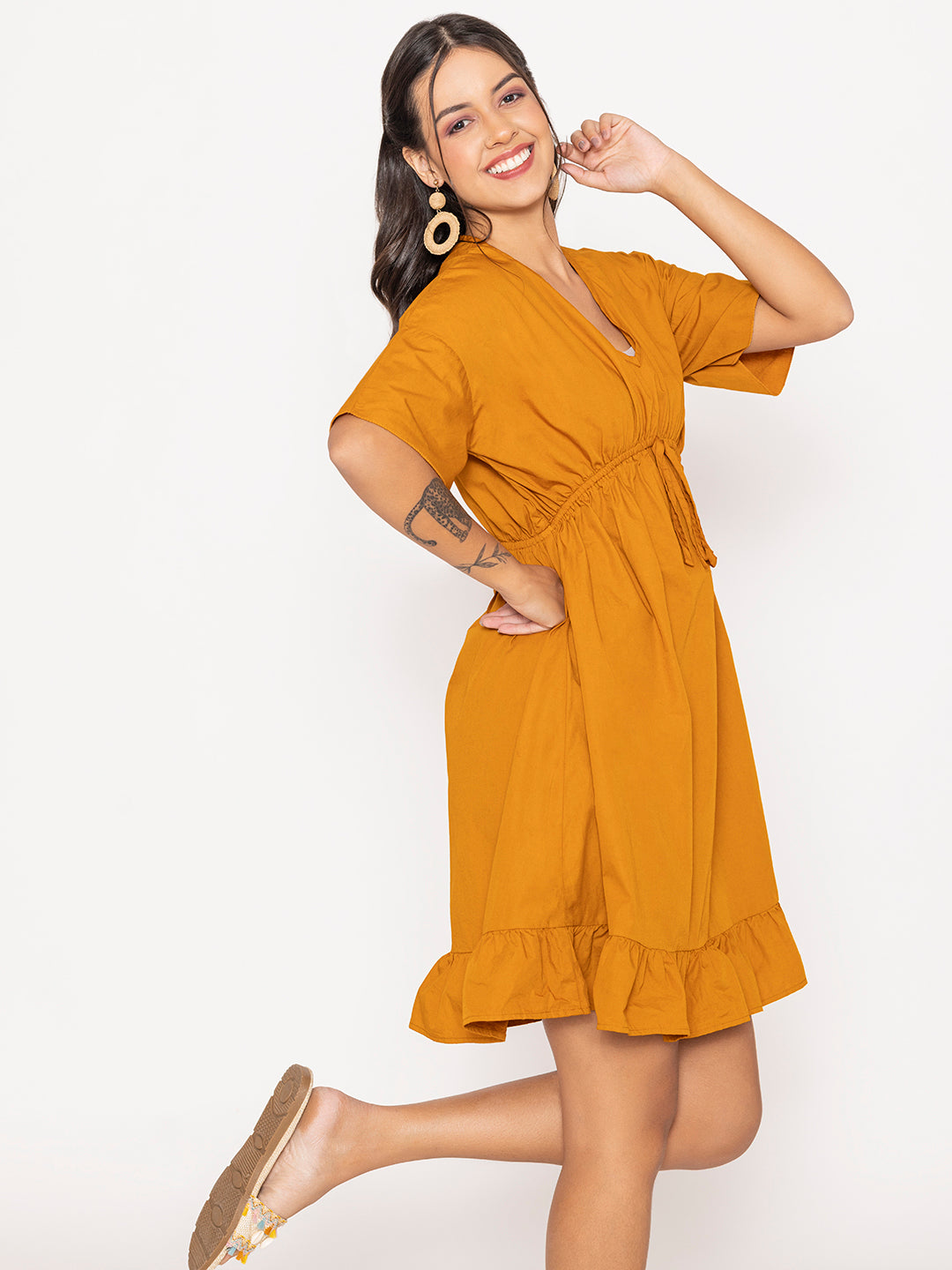 Back view of the tan brown cotton dress