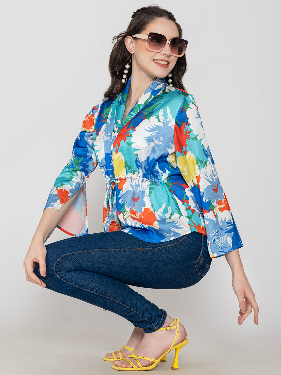 Full outfit view of blue floral satin top