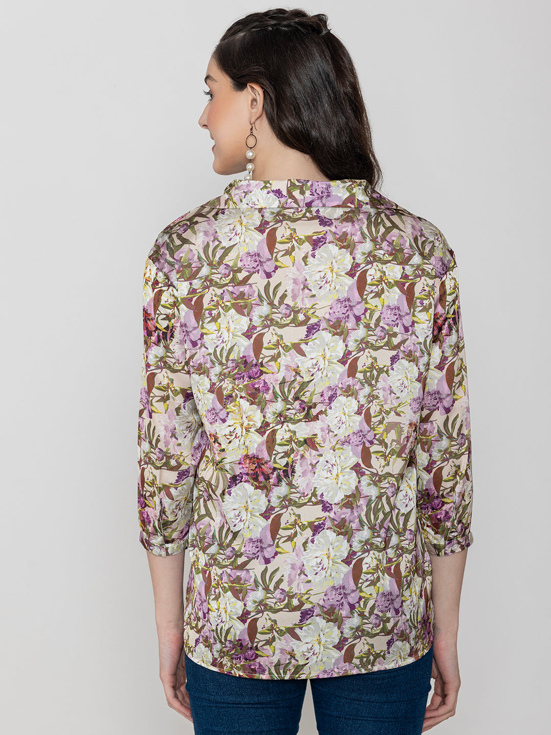 Back view of purple floral satin top