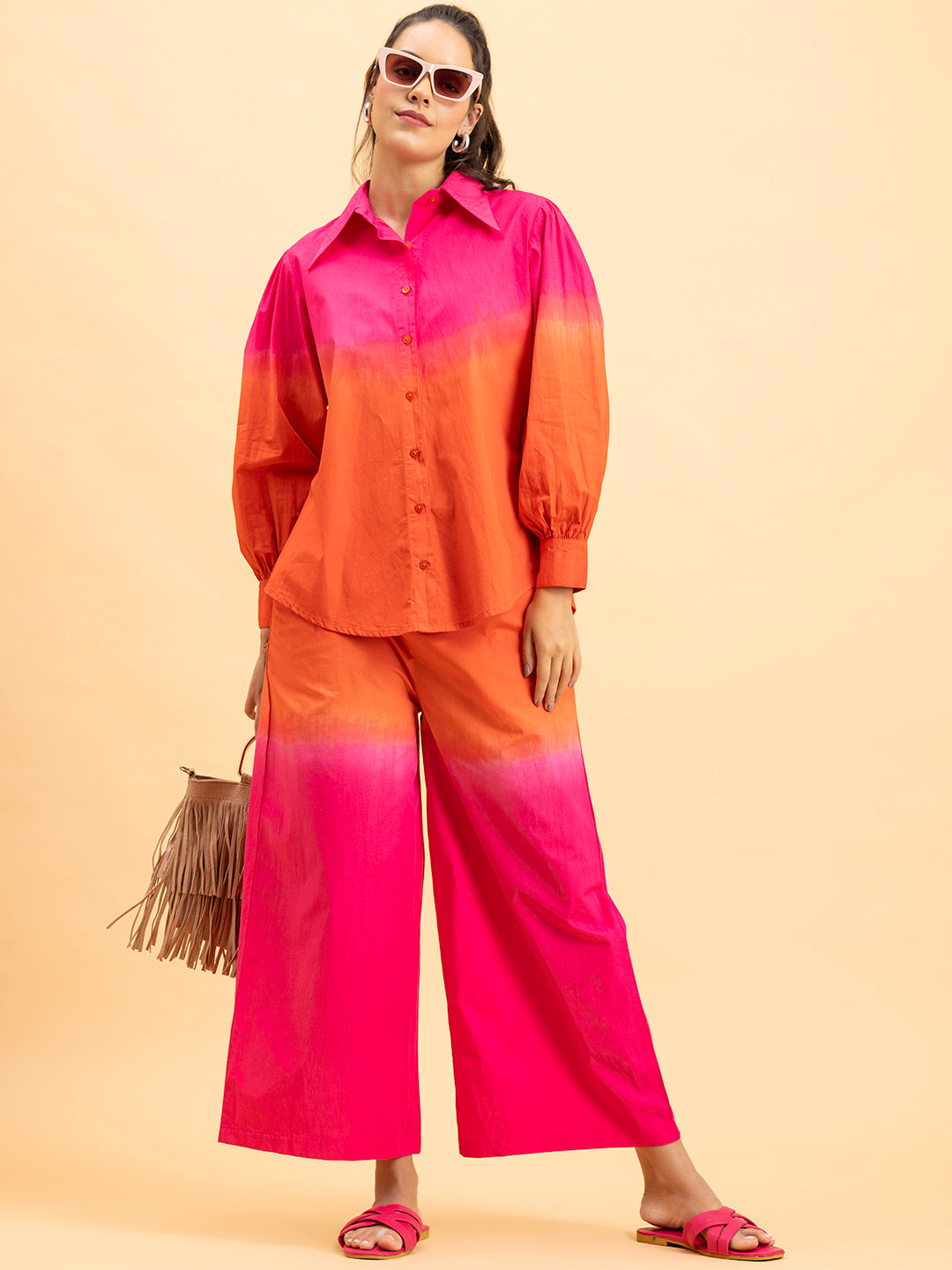 Side angle of pink orange ombre cotton co-ord on model
