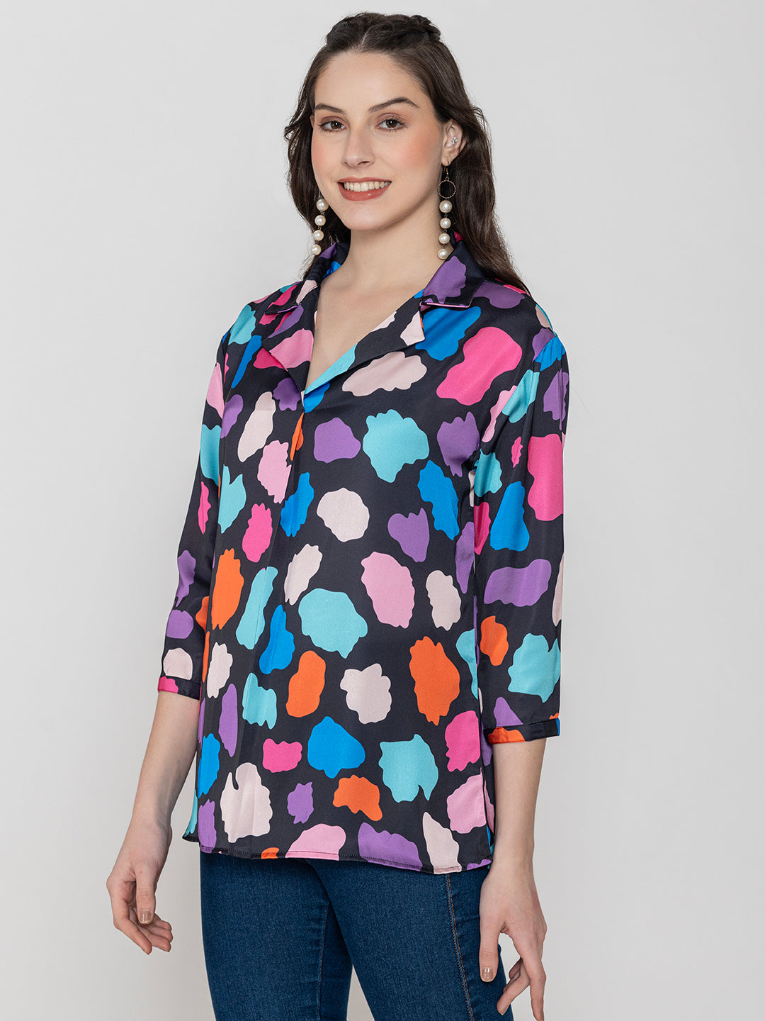Detail shot of shirt collar on multi print satin top