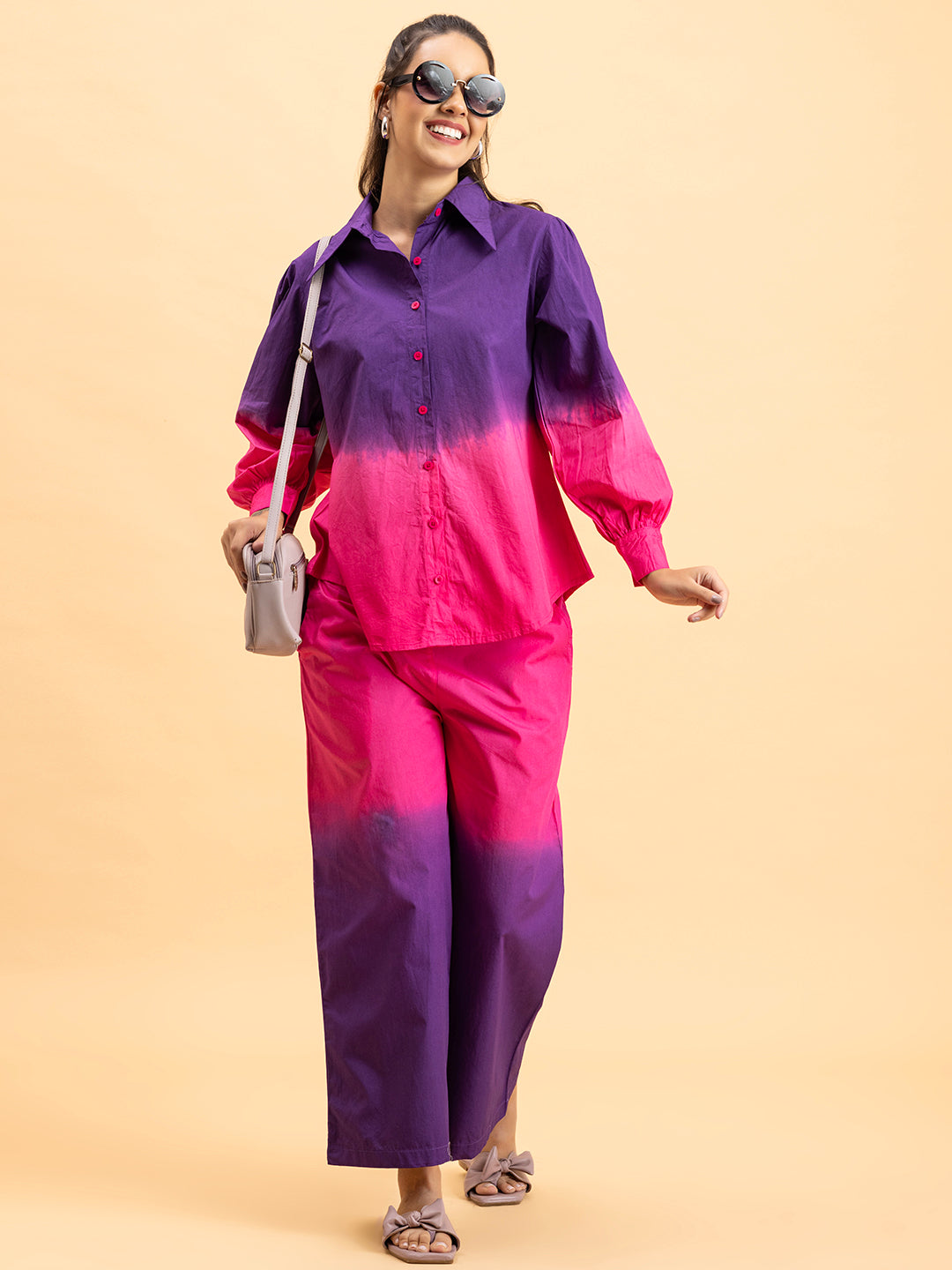 Close-up of tie-dye gradient on purple pink cotton fabric