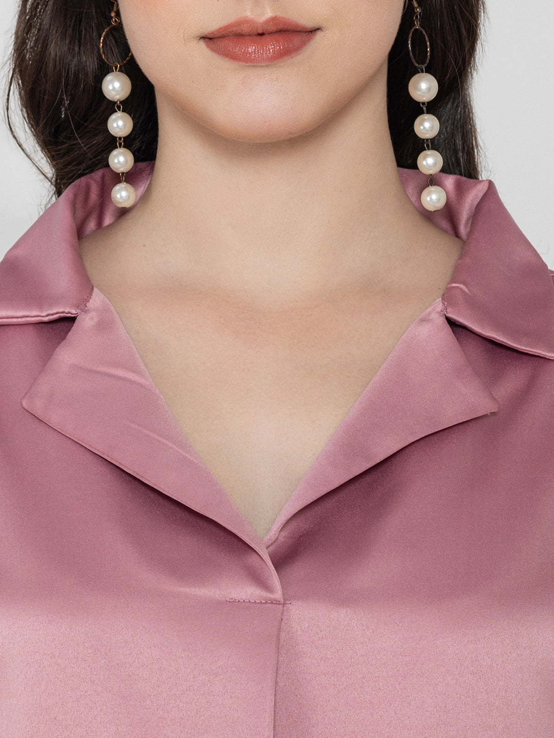 Back view of light pink satin top