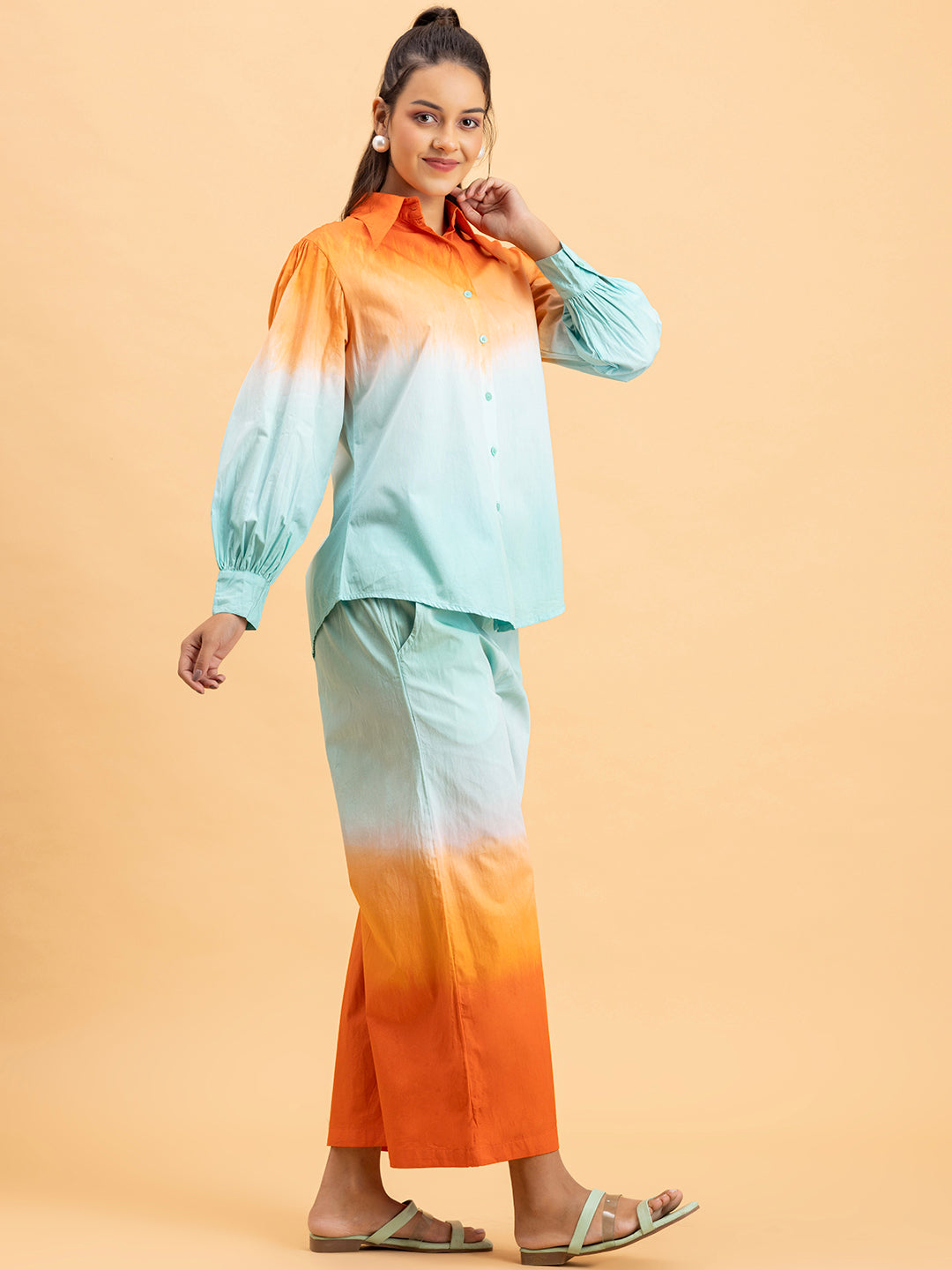 Lifestyle shot of model in orange blue ombre co-ord set