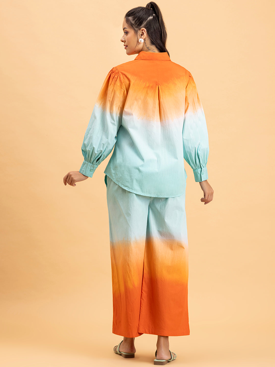 Detail of tie-dye texture on orange blue cotton co-ord
