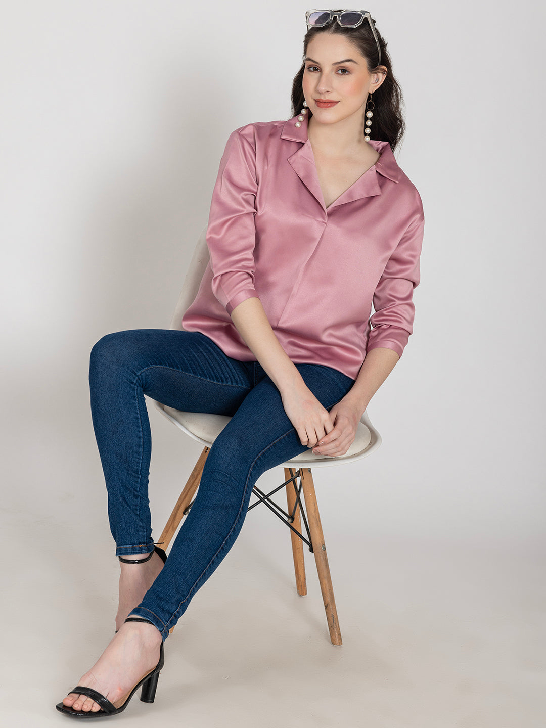 Full outfit view of light pink satin top
