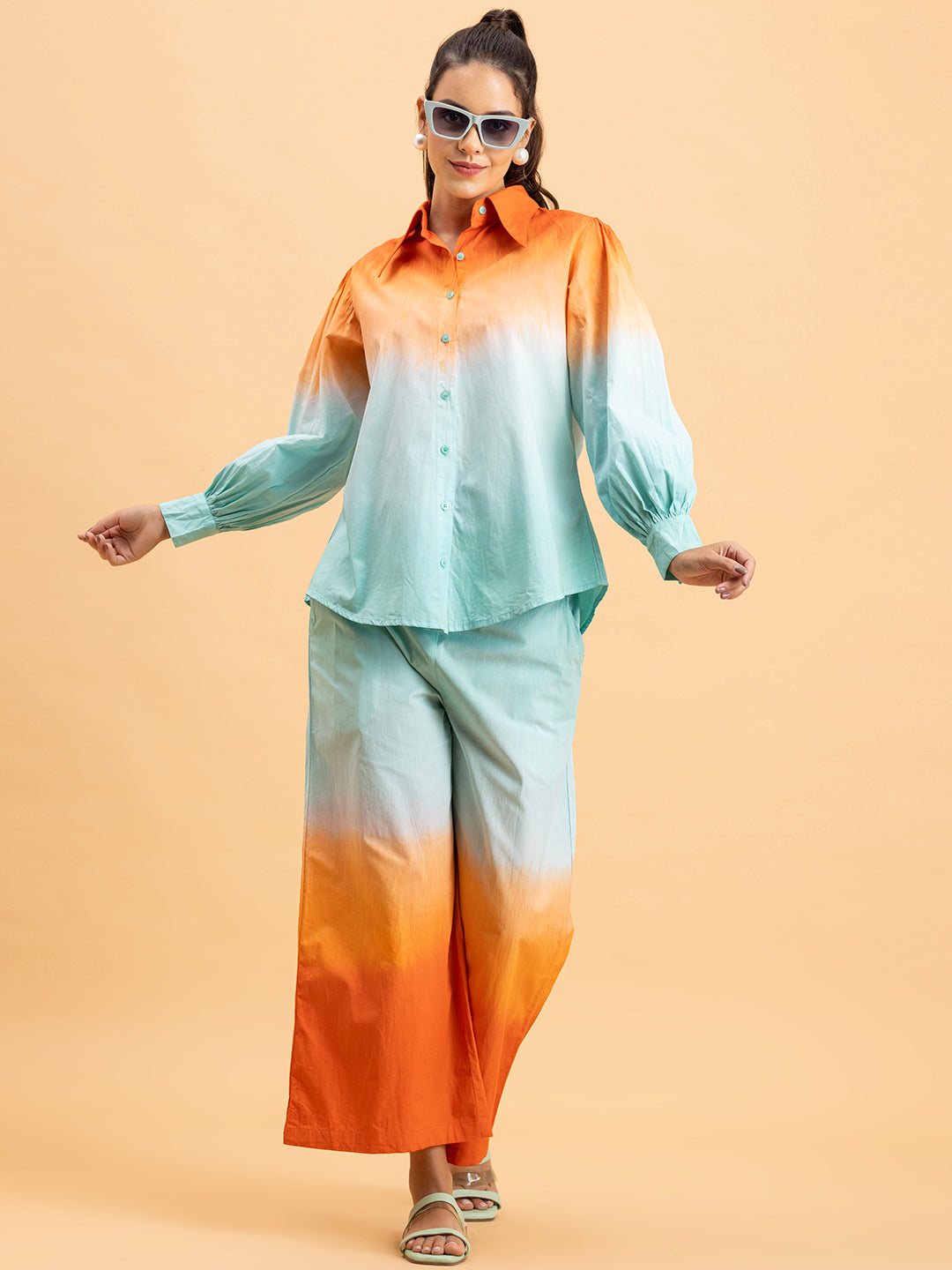 Styled outfit shot of orange blue ombre cotton co-ord