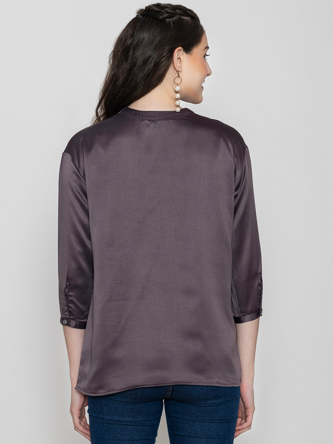 Close-up of steel grey satin fabric