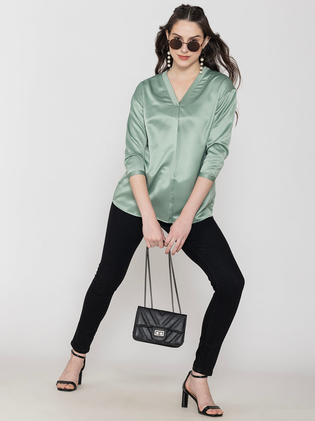 Side view of light green satin top