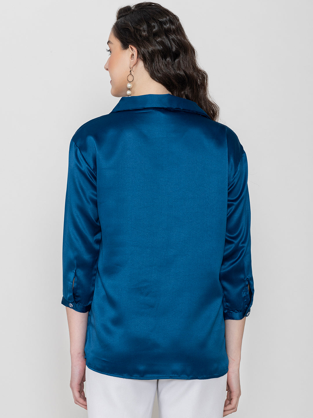 Close-up of navy blue satin fabric