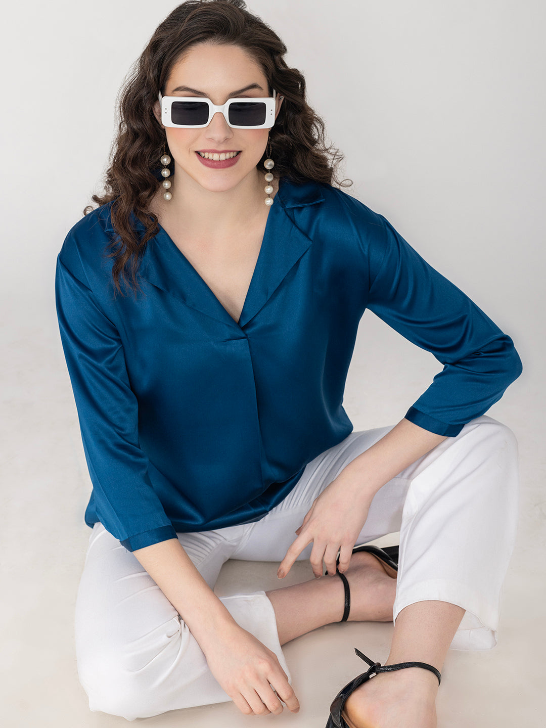 Front view of navy blue satin shirt collar top