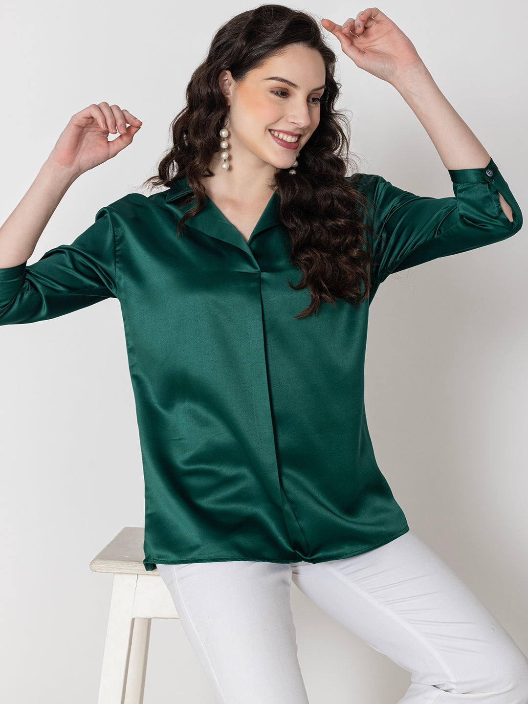 Front view of dark green satin shirt collar top