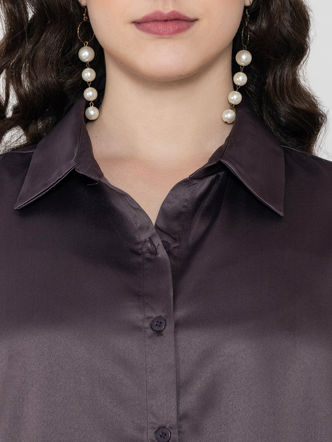 Close-up of grey satin fabric and collar detail