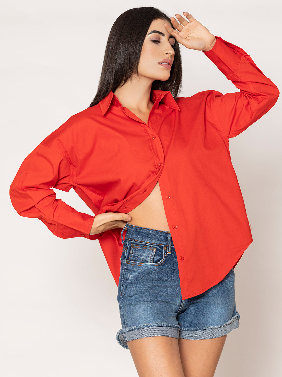 Front view of red cotton poplin oversized shirt for women